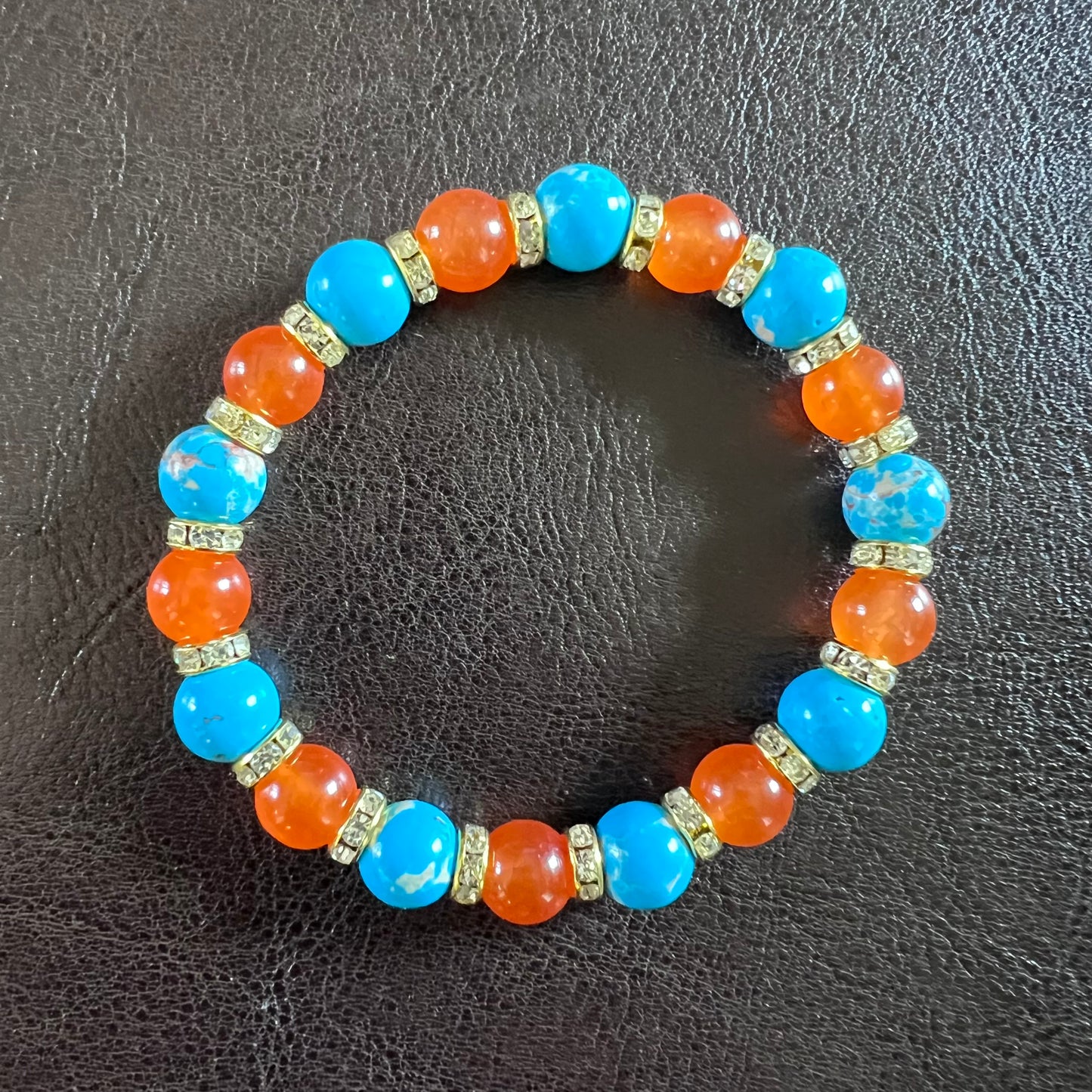 Blue Fililuck with orange bracelet