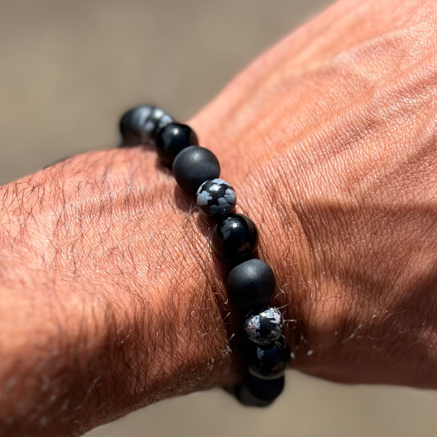 Onyx (matte) and snowflake obsidian bracelet