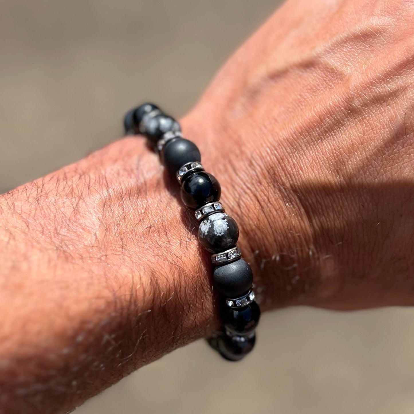 Onyx (matte) and snowflake obsidian bracelet with black spacers