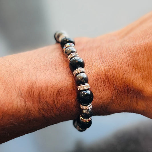 Onyx and Snowflake Obsidian bracelet with silver spacers