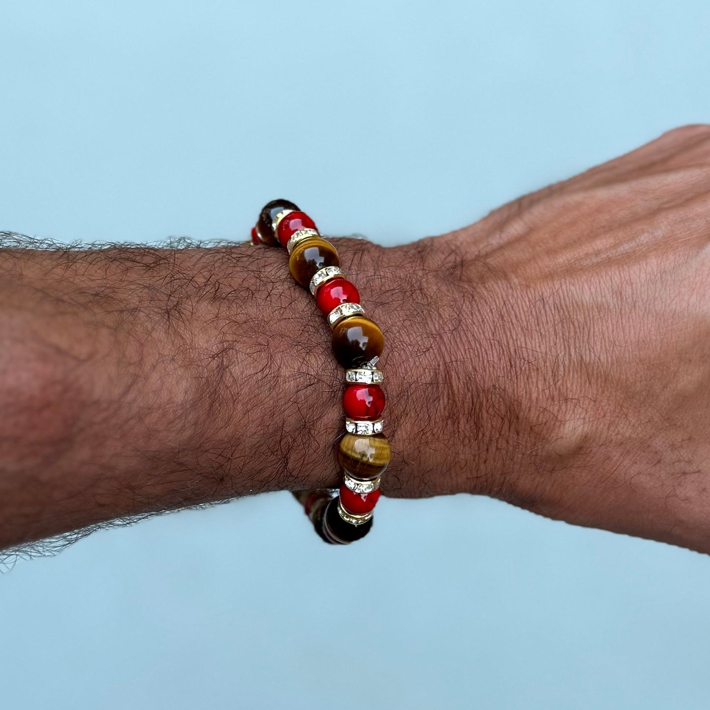Brown Tigers eye bracelet with red beads and gold spacers